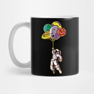 Astronaut holding a planetary balloon Mug